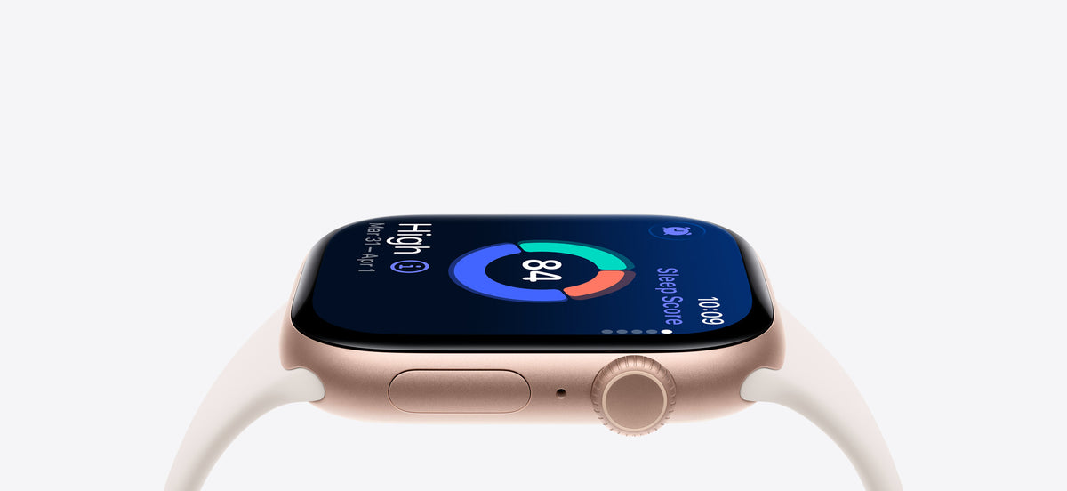 Smartwatch displaying sleep score 84 on colorful screen, rose gold case with white band